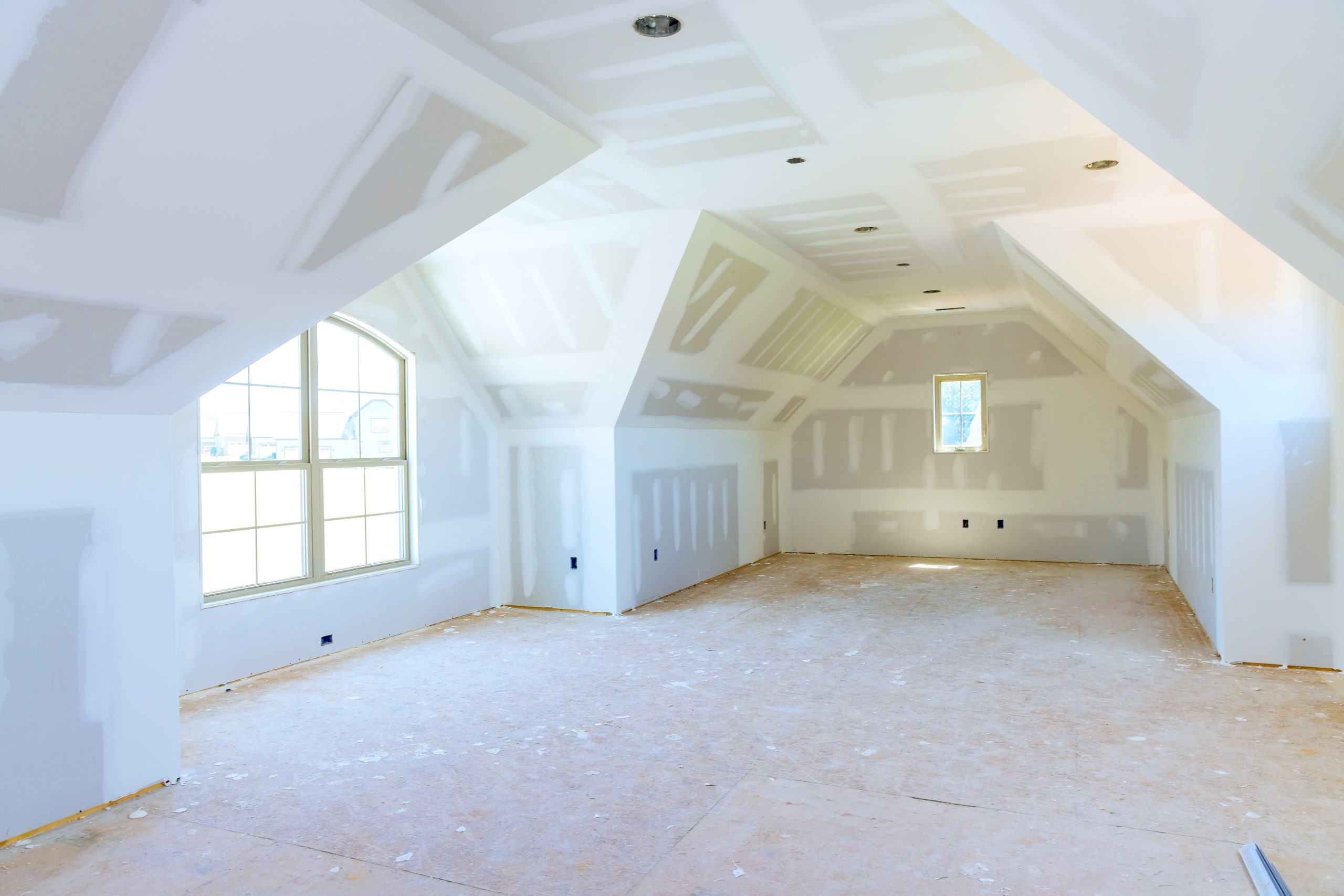 Interior drywall walls ceiling of new house are plastered a ready for paint priming